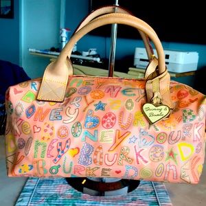 Dooney and Bourke gorgeous like new satchel! Bright colors with leather!